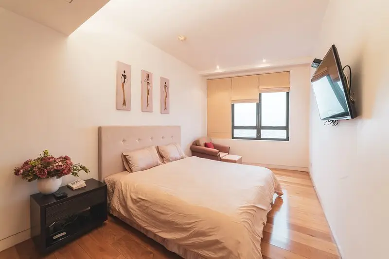 Living area of the Two-Bedroom Apartment at IPH Indochina