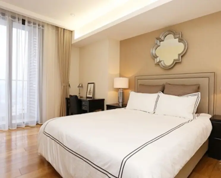 Spacious living area of the Three-Bedroom Apartment at IPH Indochina